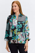 Woman wearing Foxcroft teal multi-print blouse with flattering fit